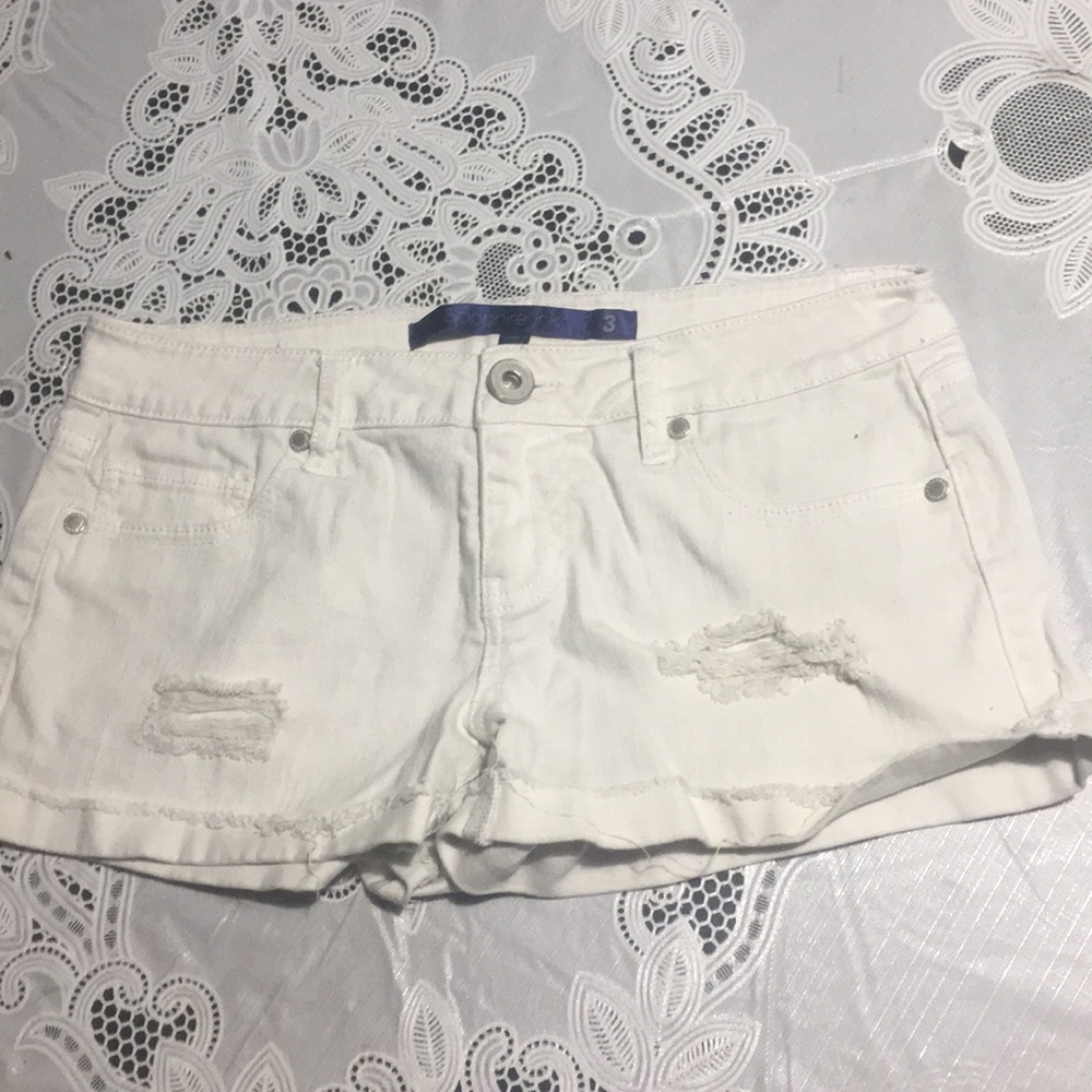 White ripped mini shorts